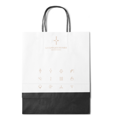 Custom White Kraft Paper Bag with Paper Rope Handle Eco‑Friendly Hot Stamping Gift Bag, Superior Print Compatibility for Hotel, Spa & Creative Industries