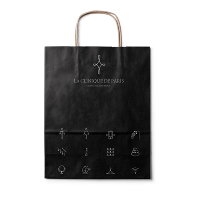 Custom White Kraft Paper Bag with Paper Rope Handle Eco‑Friendly Hot Stamping Gift Bag, Superior Print Compatibility for Hotel, Spa & Creative Industries